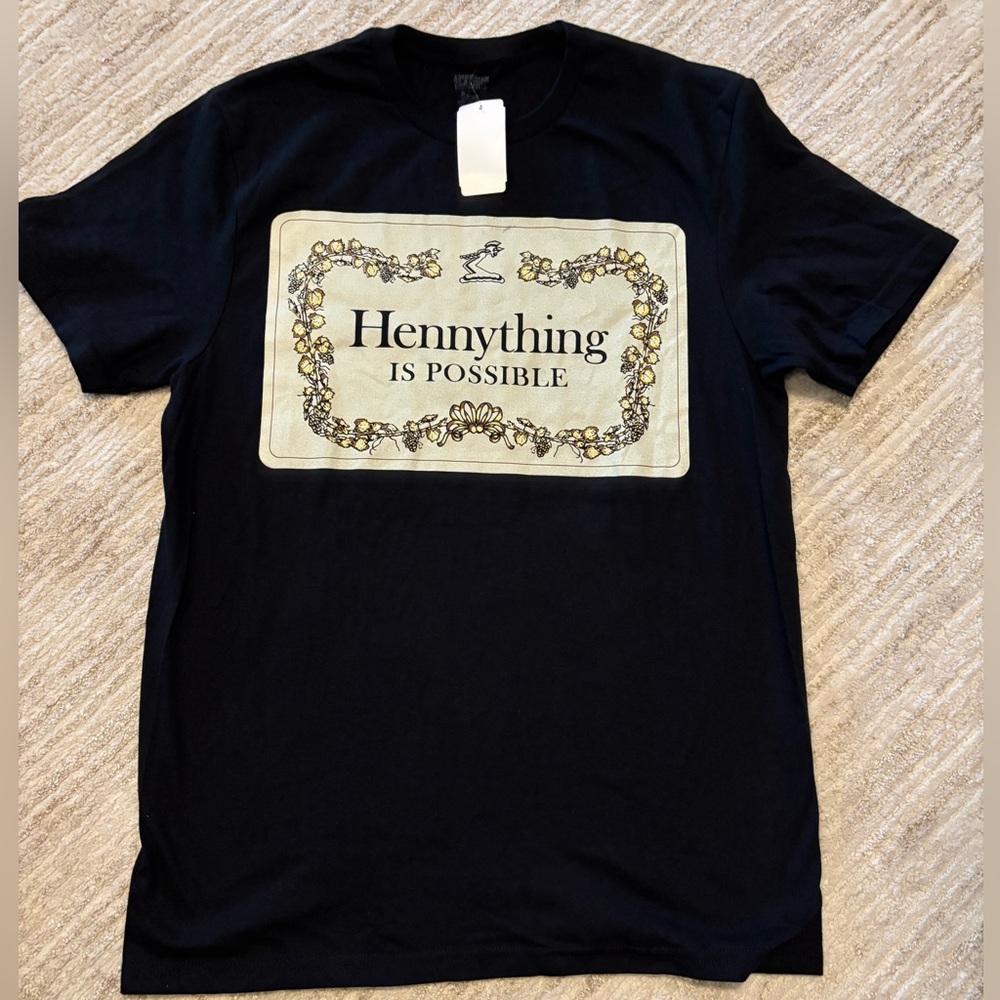 American Classics Black Graphic Tee
Hennything is Possible
Size Medium